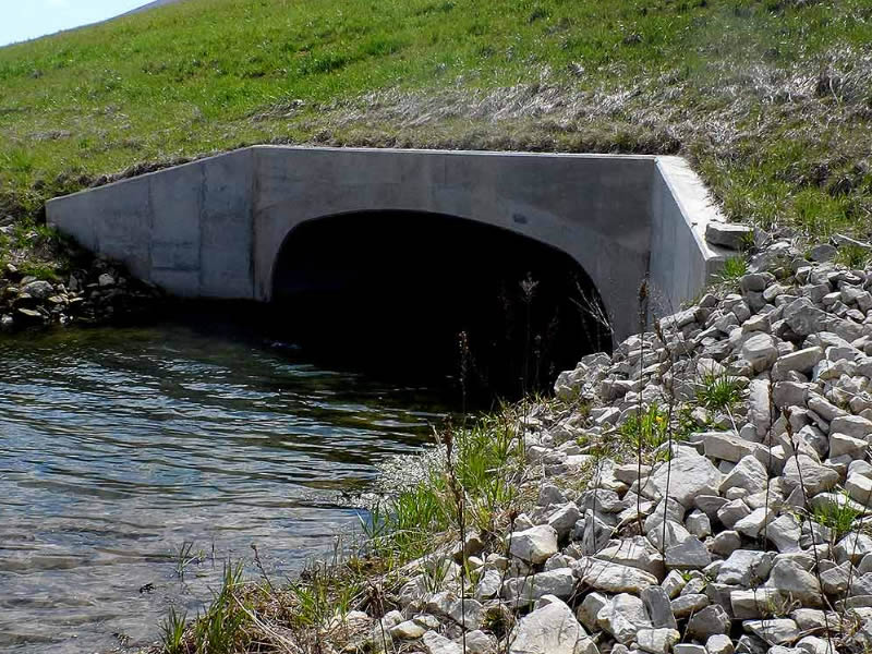 Drainage headwall and channel